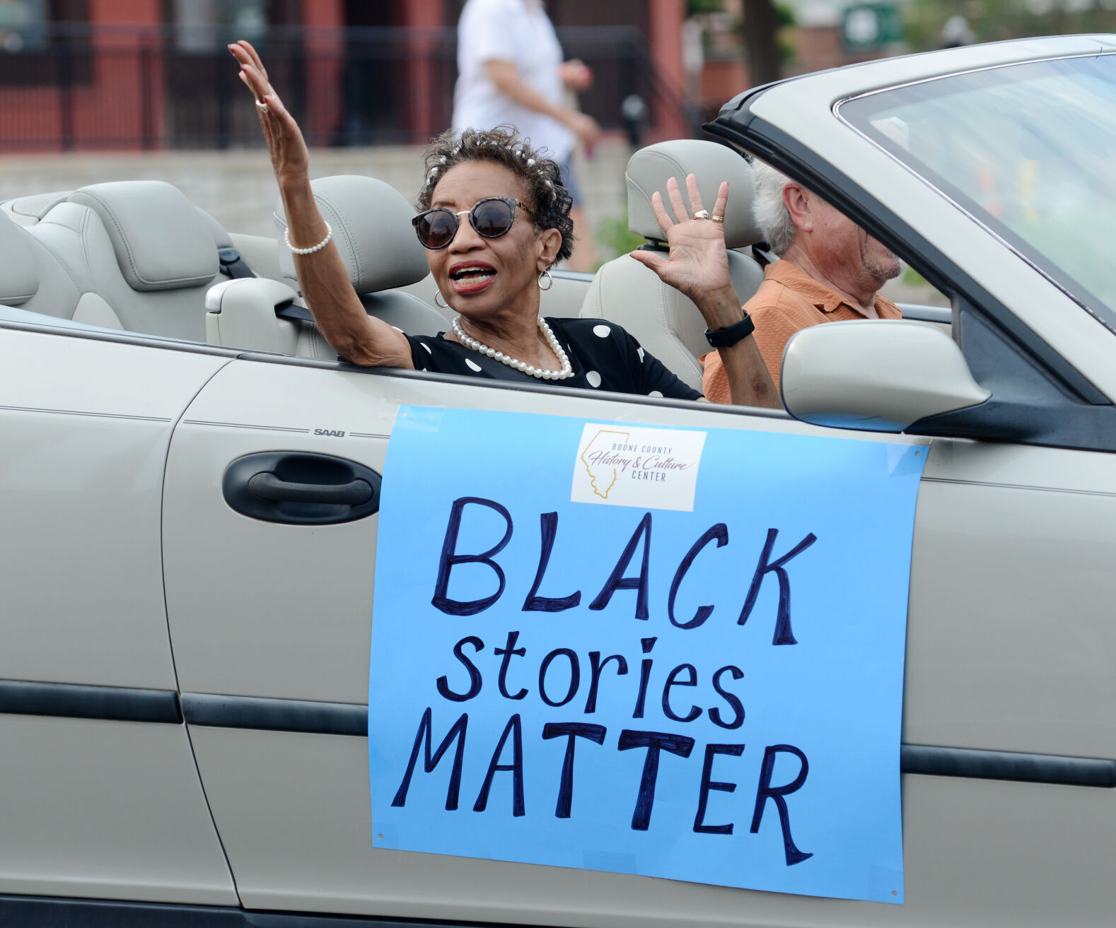 Barbra Horrell waves out of her car